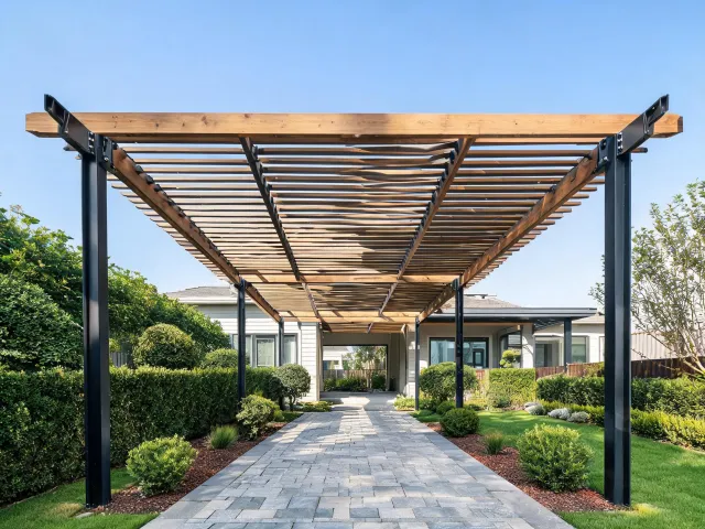 Modern pergola with shade panels over a patio walkway